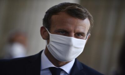 Macron salgın önlemlerini anlatırken maskesini çıkarınca tepki aldı