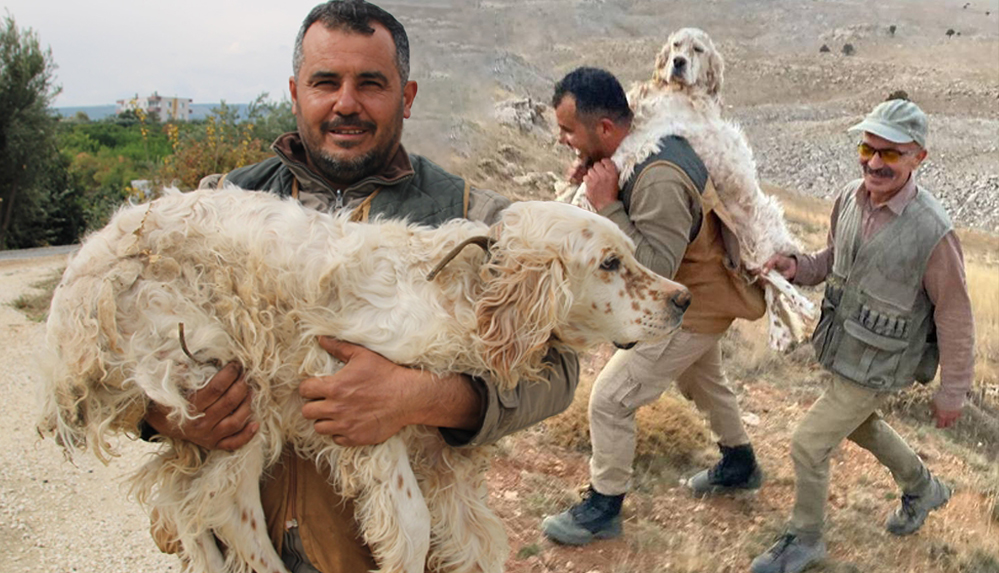 Mersin’de avcı, yorulan köpeği sırtında taşıdı